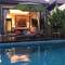 Отель Plunge Tropical Villa