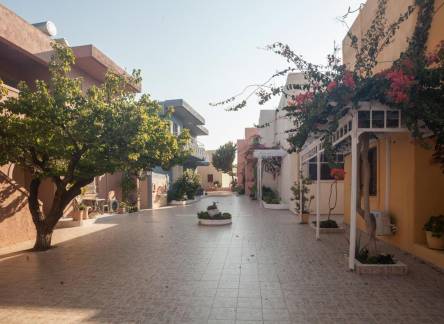 Отель EVINA ROOMS & SUITES
