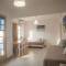 Отель EVINA ROOMS & SUITES