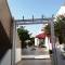 Отель EVINA ROOMS & SUITES
