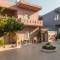 Отель EVINA ROOMS & SUITES