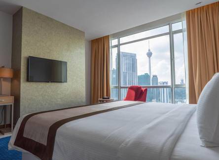 Отель Tamu Hotel & Suites