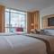 Отель Tamu Hotel & Suites