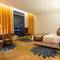 Отель Tamu Hotel & Suites
