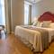 Отель Bairro Alto Suites