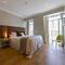 Отель Bairro Alto Suites