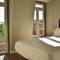 Отель Bairro Alto Suites