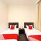 Отель OYO 750 Comfort Hotel
