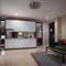 Отель The Grove Suites