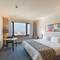 Отель Mona Plaza Hotel