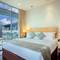 Отель PARKROYAL Serviced Suites Kuala Lumpur