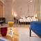 Отель Monogram Premium Suites