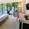 Отель Hotel NEO+ Kuta Legian