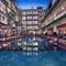 Отель Hotel NEO+ Kuta Legian