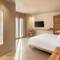 Отель Lavish Suites