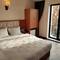 Отель The Camelot Hotel