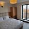 Отель The Camelot Hotel