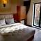 Отель The Camelot Hotel