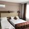Отель The Reina Hotel