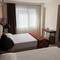 Отель The Reina Hotel