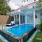 Отель Benoa Sea Suites and Villas