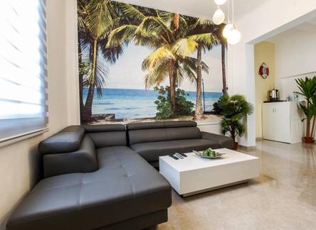 Отель Designed Beach Apartments
