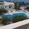 Отель Achlia Apartments and Villas
