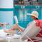 Отель Al Jaddaf Rotana Suite Hotel