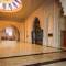 Отель Al Jaddaf Rotana Suite Hotel