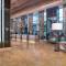 Отель Al Jaddaf Rotana Suite Hotel