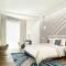 Отель Adagio Premium The Palm