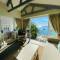 Отель Le Nautique Luxury Beachfront Apartments