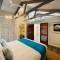 Отель Le Nautique Luxury Beachfront Apartments