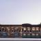 Отель The Olivar Suites