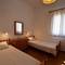 Отель Madoupa Beach Apartments