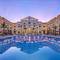 Отель The St Regis Almasa Hotel