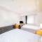 Отель SureStay Plus Hotel by Best Western Shin-Osaka