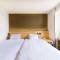 Отель SureStay Plus Hotel by Best Western Shin-Osaka