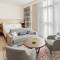 Отель Staybridge Suites Dubai Al-Maktoum Airport, an IHG Hotel