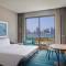Отель DoubleTree by Hilton Sharjah Waterfront Hotel And Residences