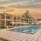 Отель Seashell Suites and Villas