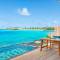 Отель Hilton Maldives Amingiri Resort & Spa