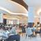 Отель Royal M Hotel & Resort Al Aqah Beach