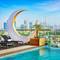 Отель Aloft Al Mina, Dubai