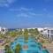 Отель Sharq Village & Spa, a Ritz-Carlton Hotel