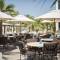 Отель Sharq Village & Spa, a Ritz-Carlton Hotel