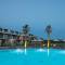 Отель Portes Lithos Luxury Resort