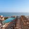 Отель Minos Ambassador All Suites & Spa