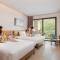Отель Holiday Inn & Suites Sanya Yalong Bay, an IHG Hotel