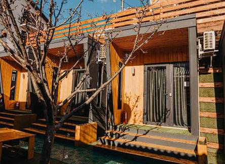 Отель EcoSuite Apartments